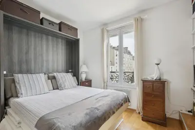 Un ou plusieurs lits dans un hébergement de l'établissement Studio St Dominique - Invalides - B'Your Home