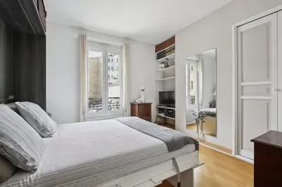 Un ou plusieurs lits dans un hébergement de l'établissement Studio St Dominique - Invalides - B'Your Home