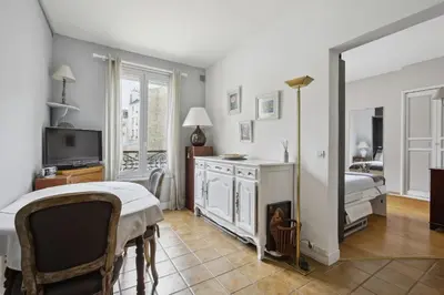 Un ou plusieurs lits dans un hébergement de l'établissement Studio St Dominique - Invalides - B'Your Home