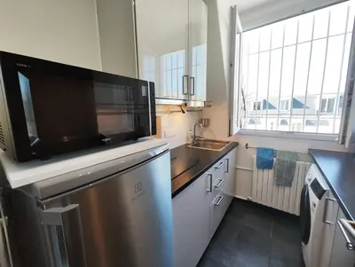 Cuisine ou kitchenette dans l'établissement Studio de charme toits parisiens