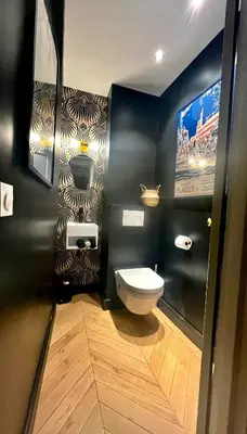 Salle de bains dans l'établissement Appartement cosy à Paris 130 m² avec projecteur !
