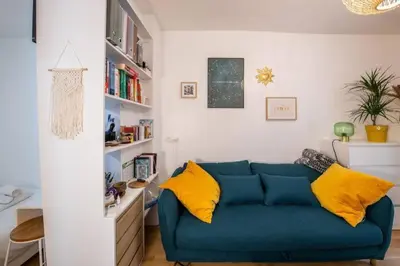 Coin salon dans l'établissement Appartement cosy avec terrasse