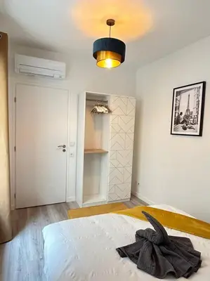 Un ou plusieurs lits dans un hébergement de l'établissement Chic in Paris - Oberkampf