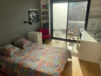 Un ou plusieurs lits dans un hébergement de l'établissement Luxury appartment 10 mn from Champs-Elysées