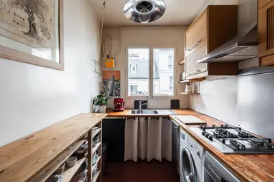 Cuisine ou kitchenette dans l'établissement Appartement Guersant - Welkeys