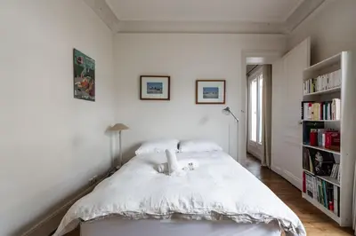 Un ou plusieurs lits dans un hébergement de l'établissement Appartement Guersant - Welkeys