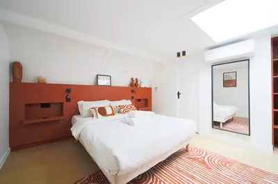 Un ou plusieurs lits dans un hébergement de l'établissement Sublime Loft à St Germain (3 chambres)