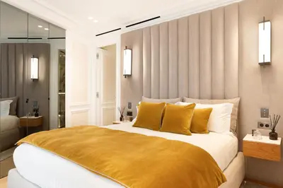 Un ou plusieurs lits dans un hébergement de l'établissement TheLander - Serviced Apartments in Champs Elysées