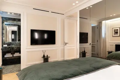 Télévision ou salle de divertissement dans l'établissement TheLander - Serviced Apartments in Champs Elysées