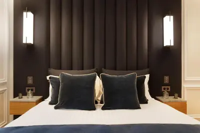 Un ou plusieurs lits dans un hébergement de l'établissement TheLander - Serviced Apartments in Champs Elysées