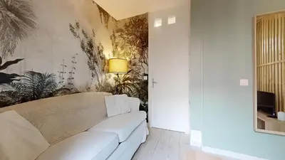 Coin salon dans l'établissement Le Vert Neuilly - 10mn Paris