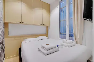 Un ou plusieurs lits dans un hébergement de l'établissement Chic apartment - 1BR-4P - Trocadero