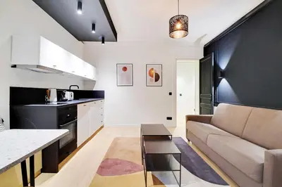 Cuisine ou kitchenette dans l'établissement Chic apartment - 1BR-4P - Trocadero