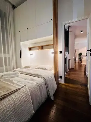 Un ou plusieurs lits dans un hébergement de l'établissement Luxury 2BR, 300m from Eiffel Tower & Rue Cler area