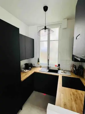 Cuisine ou kitchenette dans l'établissement Luxury 2BR, 300m from Eiffel Tower & Rue Cler area