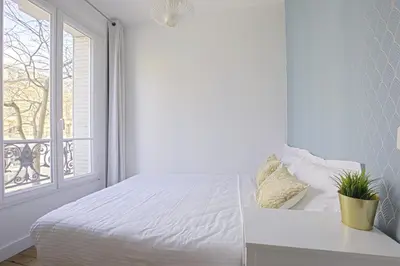 Un ou plusieurs lits dans un hébergement de l'établissement Luxury in the so chic 16th district