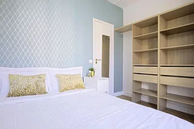 Un ou plusieurs lits dans un hébergement de l'établissement Luxury in the so chic 16th district