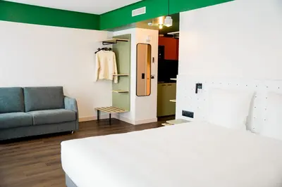 Un ou plusieurs lits dans un hébergement de l'établissement All Suites Appart Hôtel et Hôtel - Paris 13 - Porte d'Italie