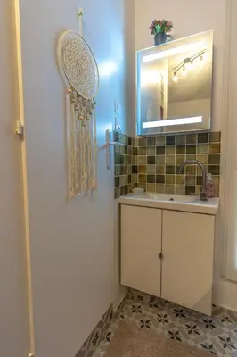 Salle de bains dans l'établissement LEDION PARIS 14