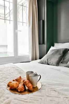 Un ou plusieurs lits dans un hébergement de l'établissement NEW ! Cosy Suite Intimate Nest Sacré Coeur Paris !