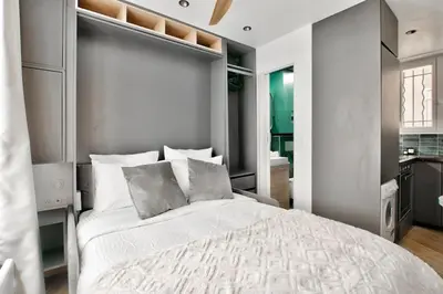 Un ou plusieurs lits dans un hébergement de l'établissement NEW ! Cosy Suite Intimate Nest Sacré Coeur Paris !