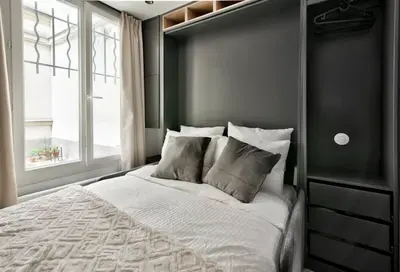 Un ou plusieurs lits dans un hébergement de l'établissement NEW ! Cosy Suite Intimate Nest Sacré Coeur Paris !