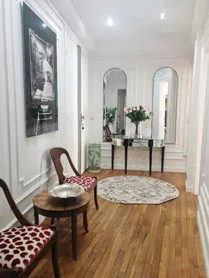 Coin salon dans l'établissement Grand Appartement Paris 16ème