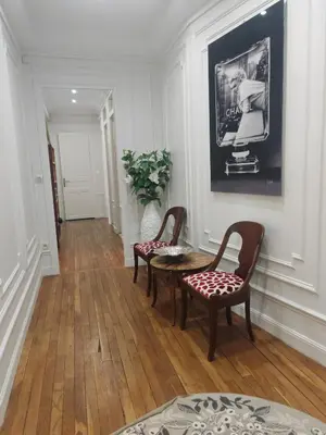 Coin salon dans l'établissement Grand Appartement Paris 16ème