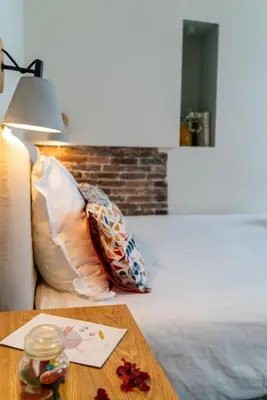 Un ou plusieurs lits dans un hébergement de l'établissement Studio cosy au cœur de Paris