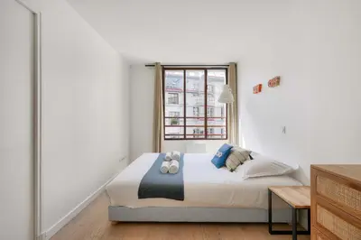 Un ou plusieurs lits dans un hébergement de l'établissement Amazing loft between Le Marais and Bastille