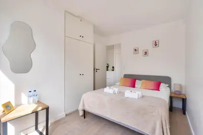 Un ou plusieurs lits dans un hébergement de l'établissement Amazing loft between Le Marais and Bastille