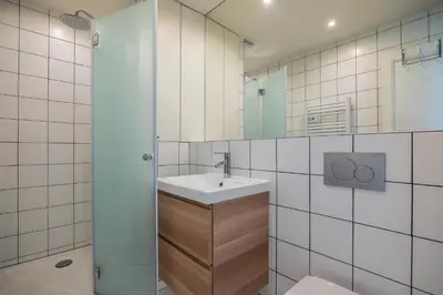 Salle de bains dans l'établissement GoodGuest-Trocadéro Tour Eiffel Bail Mobilité