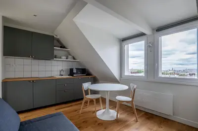 Cuisine ou kitchenette dans l'établissement GoodGuest-Trocadéro Tour Eiffel Bail Mobilité
