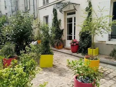 Jardin de l'établissement 2 chambres et une terrasse à Paris!