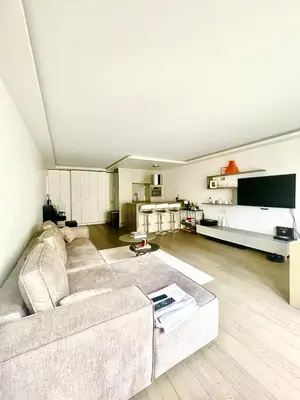 Coin salon dans l'établissement Appartement proche Étoile