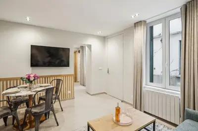 Coin salon dans l'établissement Cozy nest 2 steps from the Marais - 4 pers