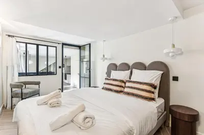 Un ou plusieurs lits dans un hébergement de l'établissement Rare pearl-Apt d'architecte-Auteuil
