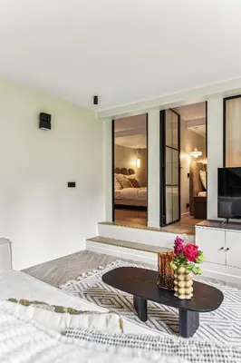 Coin salon dans l'établissement Rare pearl-Apt d'architecte-Auteuil