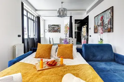 Coin salon dans l'établissement 257 Suite Pouchet - Superbe Appartement à Paris