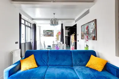 Coin salon dans l'établissement 257 Suite Pouchet - Superbe Appartement à Paris