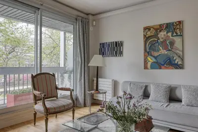 Coin salon dans l'établissement Luminous & Modern Flat with Balcony Paris-Bastille