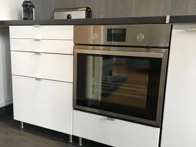 Cuisine ou kitchenette dans l'établissement Grand Studio design avec parking