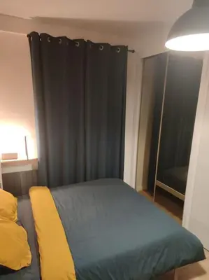 Un ou plusieurs lits dans un hébergement de l'établissement Le nid douillet - Cosy and very close to Paris