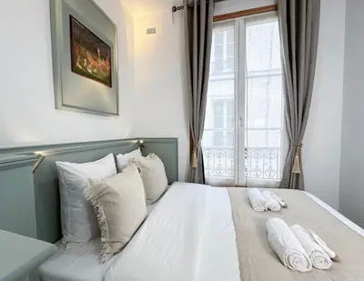 Un ou plusieurs lits dans un hébergement de l'établissement Opera - Prestige apartment with lift for 4