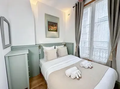 Un ou plusieurs lits dans un hébergement de l'établissement Opera - Prestige apartment with lift for 4