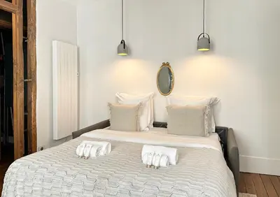 Un ou plusieurs lits dans un hébergement de l'établissement Opera - Prestige apartment with lift for 4
