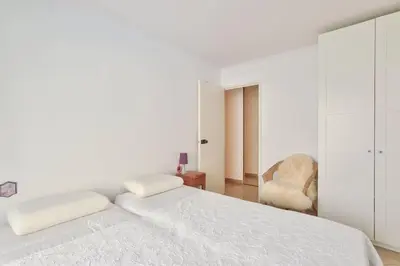 Un ou plusieurs lits dans un hébergement de l'établissement Cosy appart avec balcon Pont de Flandres - Crimée