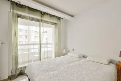 Un ou plusieurs lits dans un hébergement de l'établissement Cosy appart avec balcon Pont de Flandres - Crimée