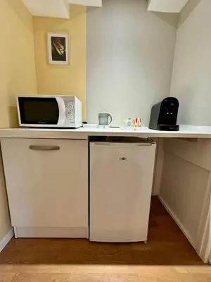 Cuisine ou kitchenette dans l'établissement Appartement lumineux près de Montmartre 
