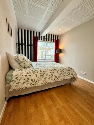 Un ou plusieurs lits dans un hébergement de l'établissement Appartement lumineux près de Montmartre 
